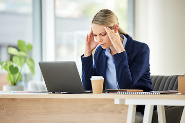 Image showing Burnout, frustrated and female professional with a headache in a workplace on a laptop with entrepreneur. Fatigue, business person and anxiety with pain at company with depression and technology.