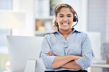 Image showing Portrait, callcenter and woman with arms crossed for telemarketing, customer service and support. Face, contact us and confident sales agent, happy consultant and crm employee from South Africa.