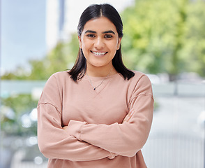 Image showing Smile, portrait and face of a young woman at home with arms crossed, happiness and confidence. Portrait of Indian female model person with a positive mindset, beauty and blurred background to relax