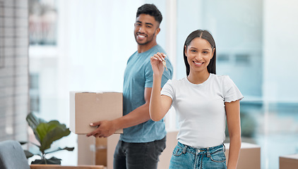 Image showing Box, keys and portrait of couple in new home excited for property, apartment and real estate investment. Relationship, moving day and man and woman with key and boxes for relocation, move and house