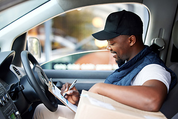 Image showing Delivery man, transport and black man writing on a clipboard with a smile for shipping or courier service. Happy african person or driver with cardboard box or package and management list in a van