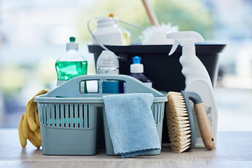 Image showing Basket, table and product for cleaning home with brush, cloth and chemical for hygiene by blurred background. Empty house, desk and plastic container for services, stop bacteria and dust in interior