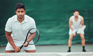 Image showing Man, team and portrait on a tennis court for competition and wellness for health in india. Male athlete, racket and together for a game in the outdoor at a sports club for training with challenge.