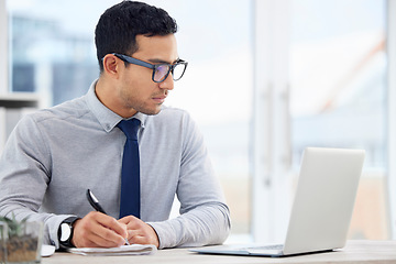 Image showing Writing, laptop and business man, accountant or employee with finance, budget and analysis or career notebook. Journal, bookkeeping notes and person reading financial report on computer for reminder