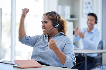 Image showing Woman, call center and fist celebration for success at desk for telemarketing or sales target. Excited consultant person winning crm bonus, deal or award with a headset for customer service startup