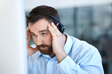 Image showing Stress, computer and tired call center man with a headset for customer support problem or headache. Frustrated person at pc for telemarketing account crisis, contact us or sales fail, mistake or loss