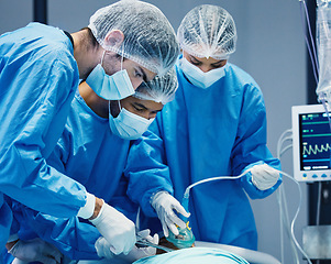 Image showing Group of doctors in surgery, healthcare and surgical procedure start with PPE and team in theatre in hospital. Medical operation, health insurance and safety gear with surgeon people in clinic