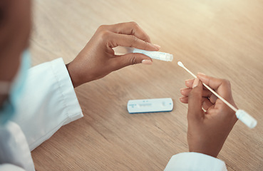 Image showing Corona virus, close of hands of doctor with swab sample and at hospital. Healthcare or examination, medication or checkup and professional nurse or surgeon with covid 19 test at a clinic for wellness