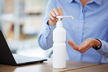 Image showing Hands, sanitizer and cleaning in office for health, safety and wellness for hygiene. Sanitize, business person and disinfect hand from bacteria, virus or germs for protection from covid in workplace