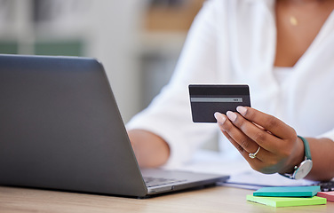 Image showing Credit card, laptop and business woman hands for online shopping, financial payment and banking for creative career. Office person typing on computer for web registration, e commerce and fintech loan