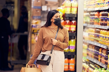 Image showing Woman in mask, grocery shopping and supermarket, safety from virus and retail. Groceries choice, refrigerator with stock and female customer safe from bacteria in shop, commercial service and sale