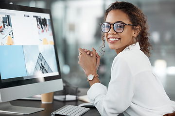 Image showing Architect woman at desk, computer screen or web design for construction firm or agency. Professional female creative with smile, portrait or working desk with research for architecture website layout