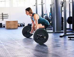 Image showing Fitness, barbell and deadlift with a man at gym for a workout, exercise or training. Male athlete person with iron weight for strong muscle, focus and agile performance or commitment at wellness club