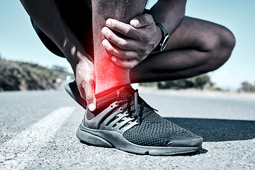 Image showing Fitness, ankle and injury with a sports man holding his joint in pain while outdoor for a workout. Exercise, emergency and accident with a male athlete feeling tender while training for recreation