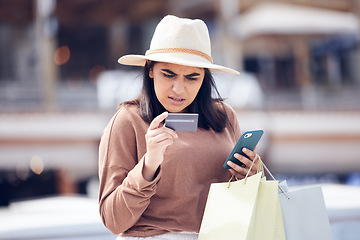 Image showing City, smartphone and woman with a credit card, confused and scam with payment, wrong password and shopping bags. Female person, fraud and customer with a cellphone, glitch and error with banking