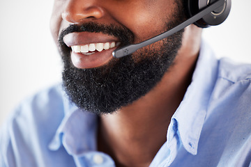 Image showing Online communication, black man with headset and smile at his desk in a modern workplace office. Telemarketing or consultant, support or customer service and male call center agent at workstation