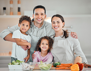 Image showing Cooking, smile and portrait of family in kitchen for health, nutrition and food. Diet, vegetables and dinner with parents and children with meal prep at home for wellness, organic salad and learning