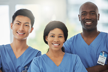 Image showing Medical, confidence and portrait of doctors with crossed arms standing in hospital. Leadership, diversity and group of professional healthcare workers with smile in collaboration at medicare clinic.