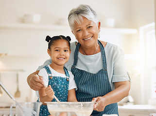 Image showing Grandmother, portrait or child baking in kitchen as a happy family with young girl learning cookies recipe. Mixing cake flour, development or grandma smiling, helping or teaching kid to bake at home