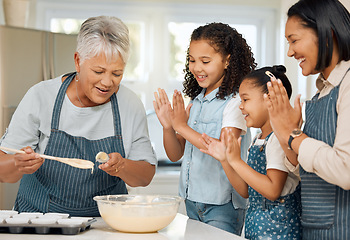 Image showing Applause for grandmother, mom or happy kids baking in kitchen as a family with young siblings learning. Mixing cake, grandma or excited parent smiling, clapping or teaching girls to bake with flour