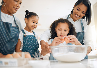 Image showing Grandmother, mom or kids baking in kitchen as a happy family with young girl learning cookies recipe. Mixing cake, parent or grandma smiling or teaching children to bake with eggs for development