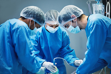 Image showing Team of doctors n surgery, health and surgical procedure start with PPE and collaboration in operation theatre in hospital. Medical, healthcare insurance and safety gear with surgeon people in clinic