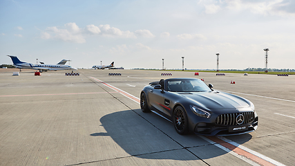 Image showing Kyiv, Ukraine - September 2, 2017: Mercedes-Benz GTs in road in airport.