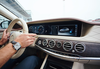 Image showing Man sitting and driving in the car.