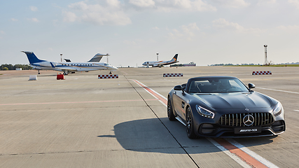 Image showing Kyiv, Ukraine - September 2, 2017: Mercedes-Benz GTs in road in airport.