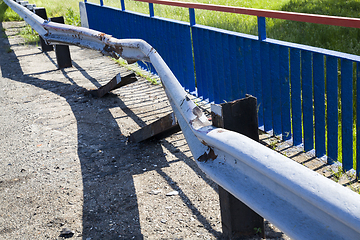 Image showing old metal barrier after the accident