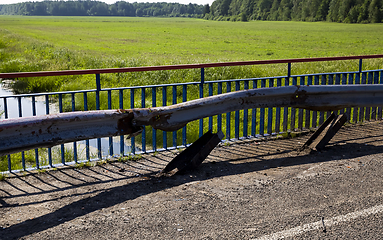 Image showing old metal barrier after the accident