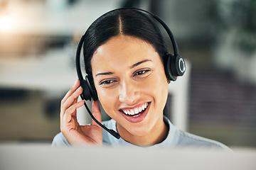 Image showing Happy woman, call center and face with a headset at computer for customer service or sales. Smile of a consultant person talking at a pc with a microphone for telemarketing, crm or help desk support