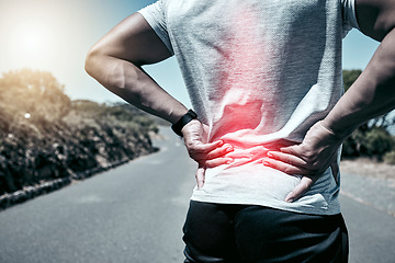 Image showing Fitness, back pain and injury with a sports man holding his sore body while outdoor for a workout. Exercise, anatomy and accident with a male athlete feeling tender while training or running alone