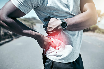 Image showing Exercise, back pain and injury with a sports man holding his sore body while outdoor for a workout. Fitness, anatomy and accident with a male athlete feeling tender while training for a cardio run