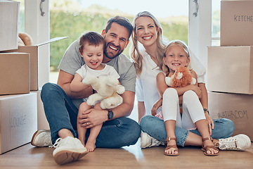 Image showing Portrait, happy family and kids on floor of new home, real estate and property loan for relocation. Children, parents and moving in together for building investment, mortgage and boxes in apartment