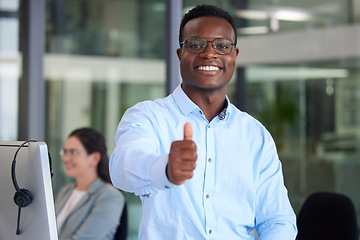 Image showing Portrait, thumbs up and a black man at work in a call center for support, motivation or assistance. Customer service, thank you and success with a male consultant working as a winner in telemarketing