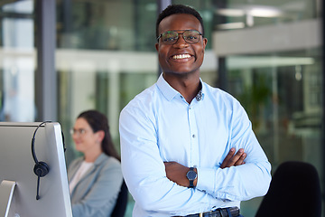 Image showing Portrait, arms crossed up and a black man at work in a call center for support or crm assistance. Customer service, confident and professional with a happy male consultant working in telemarketing