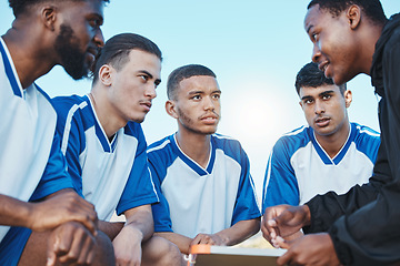 Image showing Sports, soccer coach and a team talking on a field for fitness exercise or outdoor game. Football formation, club and diversity athlete men listen to plan for coaching, scrum and training strategy