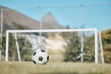 Image showing Soccer ball, sports and goal post on empty field for mockup space, fitness and training outdoor. Football club, pitch and event or game for sport competition, exercise and green grass background