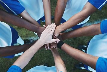 Image showing Hands stacked, above and men on a soccer field for support, motivation and team spirit. Sports, training and athlete football players with a gesture for celebration, solidarity and trust at a game