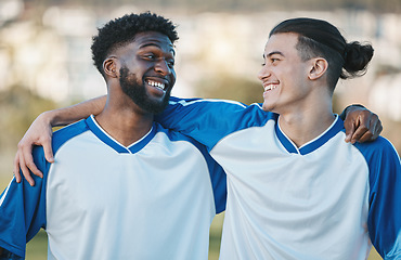 Image showing Fitness, soccer and friends with sports men hugging during training, a game or competition outdoor. Football, exercise or workout with a young man athlete and his friend happy together after a match