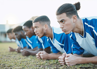 Image showing Plank, sports group and soccer team on field for fitness training, workout or exercise outdoor. Football player, club and face of athlete people with strong focus for sport competition or challenge