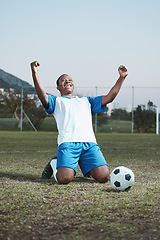 Image showing Soccer ball, sports and man celebrate goal on field for competition, fitness or training outdoor. Black male athlete football player, pitch and game celebration for sport achievement, success or win