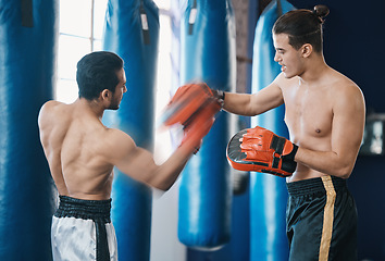 Image showing Sports, boxing and man with coach in gym for training, workout and exercise for mma. Fitness, body builder and male athlete with personal trainer for boxer competition, practice match and fighting