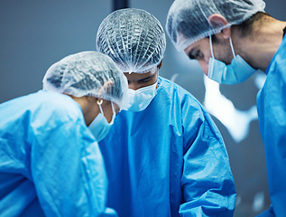 Image showing Team of doctors n surgery, healthcare and surgical procedure start with PPE and collaboration in operation theatre in hospital. Medical, health insurance and safety gear with surgeon people in clinic