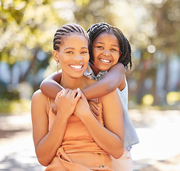 Image showing Hug, mother and daughter portrait in park relaxing together on summer holiday with smile. Support, girl child or happy black woman, mom and bonding in embrace with love in garden in South Africa