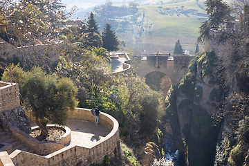 Image showing Panoramic view of hanging gardens of Cuenca over El Tajo Gorge with whitewashed houses of Ronda, Andalusia, Spain.