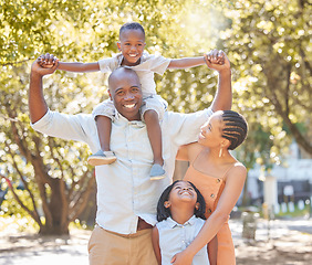 Image showing Portrait, mother or father with happy kids in park to relax with smile or wellness on family holiday together. African dad, mom or child bonding or smiling with lovely parents in nature in summer