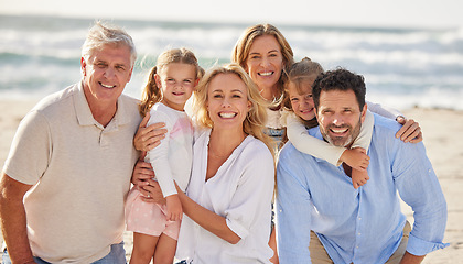 Image showing Family at beach, grandparents and parents with kids in portrait, travel and freedom with love and vacation. Face of happy people, generations and tourism in New Zealand while bonding together outdoor