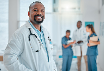 Image showing Happy, doctor and portrait of black man in hospital for medical help, insurance and trust. Healthcare, clinic team and face of professional male health worker smile for service, consulting and care